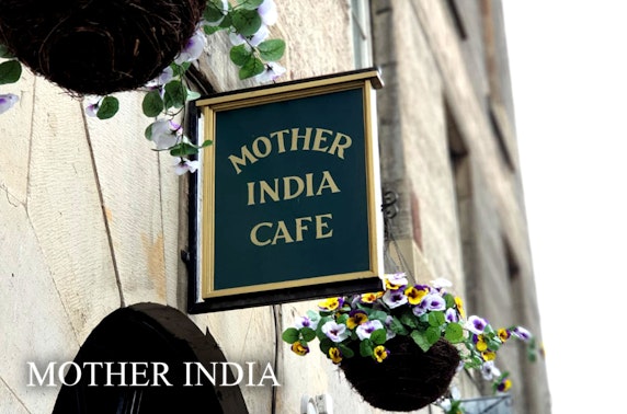Mother India's Cafe sharing lunch